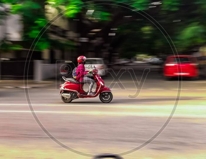 Panning shot of scooter