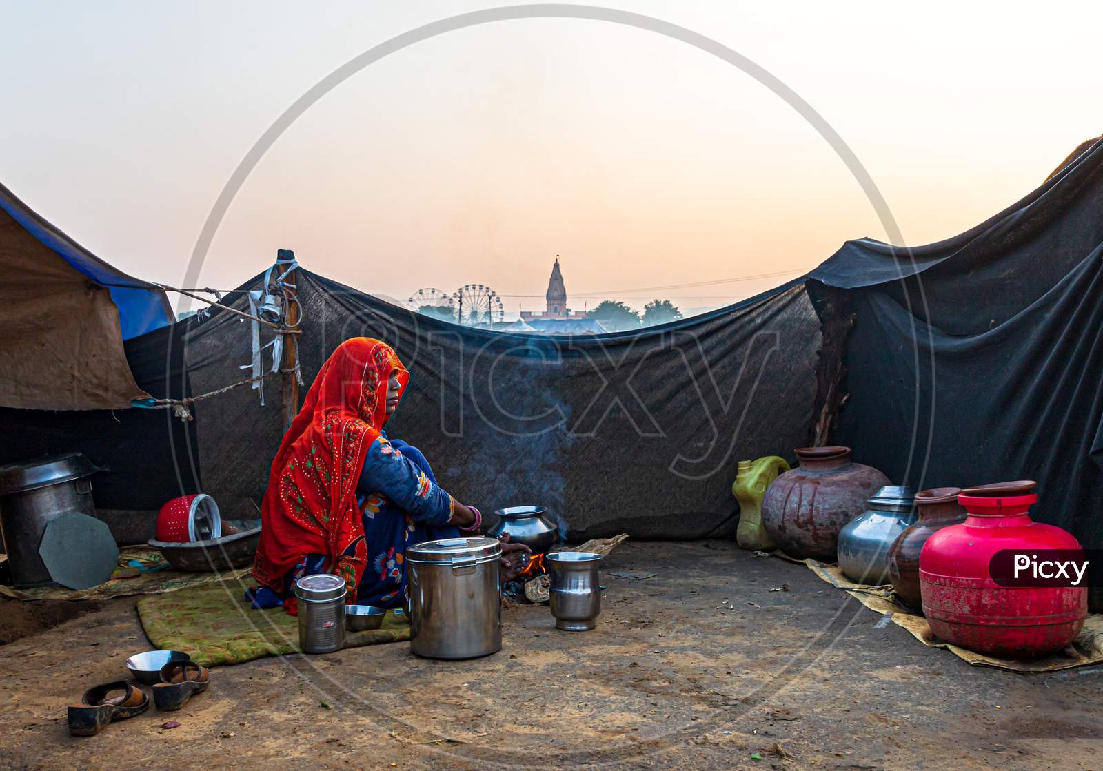 Nomadic Woman Making Food At Pushkar Camel Festival.