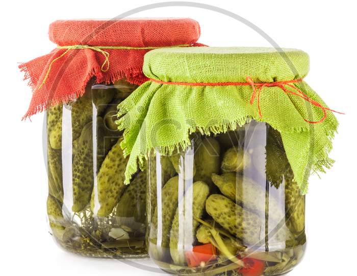 Pickles Cucumbers And Gherkins In Glass Jar Isolated On White