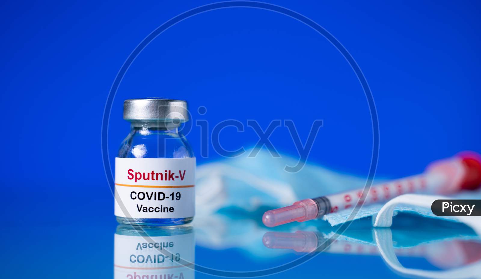 Maski, India - Nov 25,2020 : Sputnik V Vaccine And Syringe To Protect Against Coronavirus Covid-19 Disease.