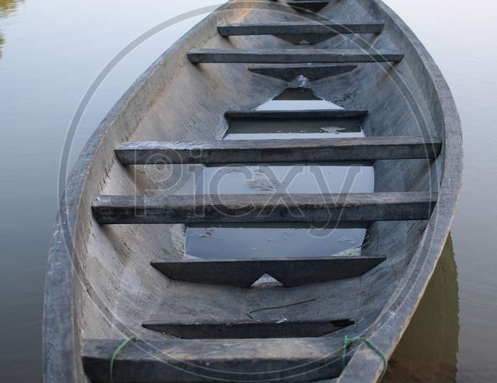 an empty boat in a lake