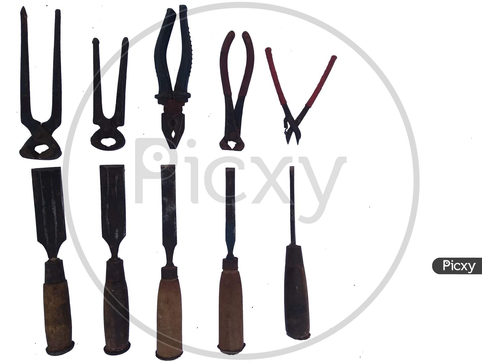 Different Types Of Carpenter Tools Like Chisel And Pliers Isolated On White Background.