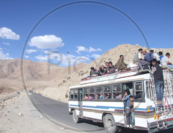 People traveling on buses
