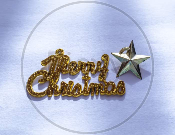 Christmas Composition. Merry Christmas Gold Text With Star Isolated On White Background. Christmas, Winter, New Year Concept. Top View