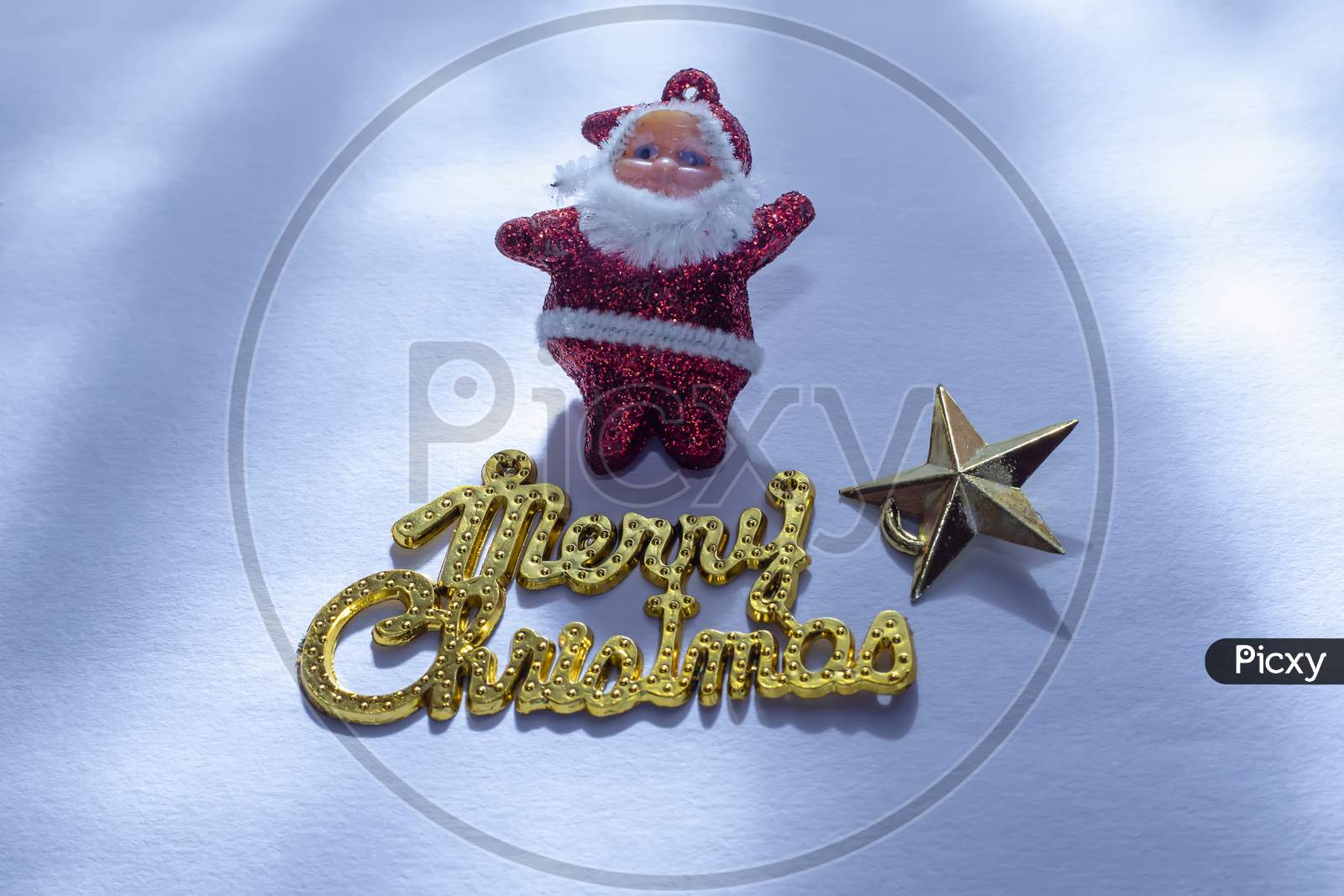 Santa Claus With A Merry Christmas Gold Text Is Isolated On A White Background Or Snow Background