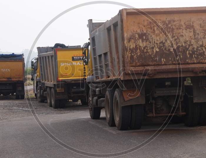 Thrissur, Kerala, India - 11-26-2020: Tipper Lorries Parked On The Side Of A Road