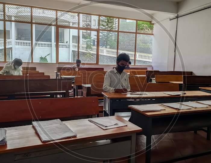 Vythiri, Kerala / India - 11.19.2020 : Indian Students Writing Examination During Covid-19 Pandemic While Keeping Social Distancing In Kerala. Calicut University Exams.