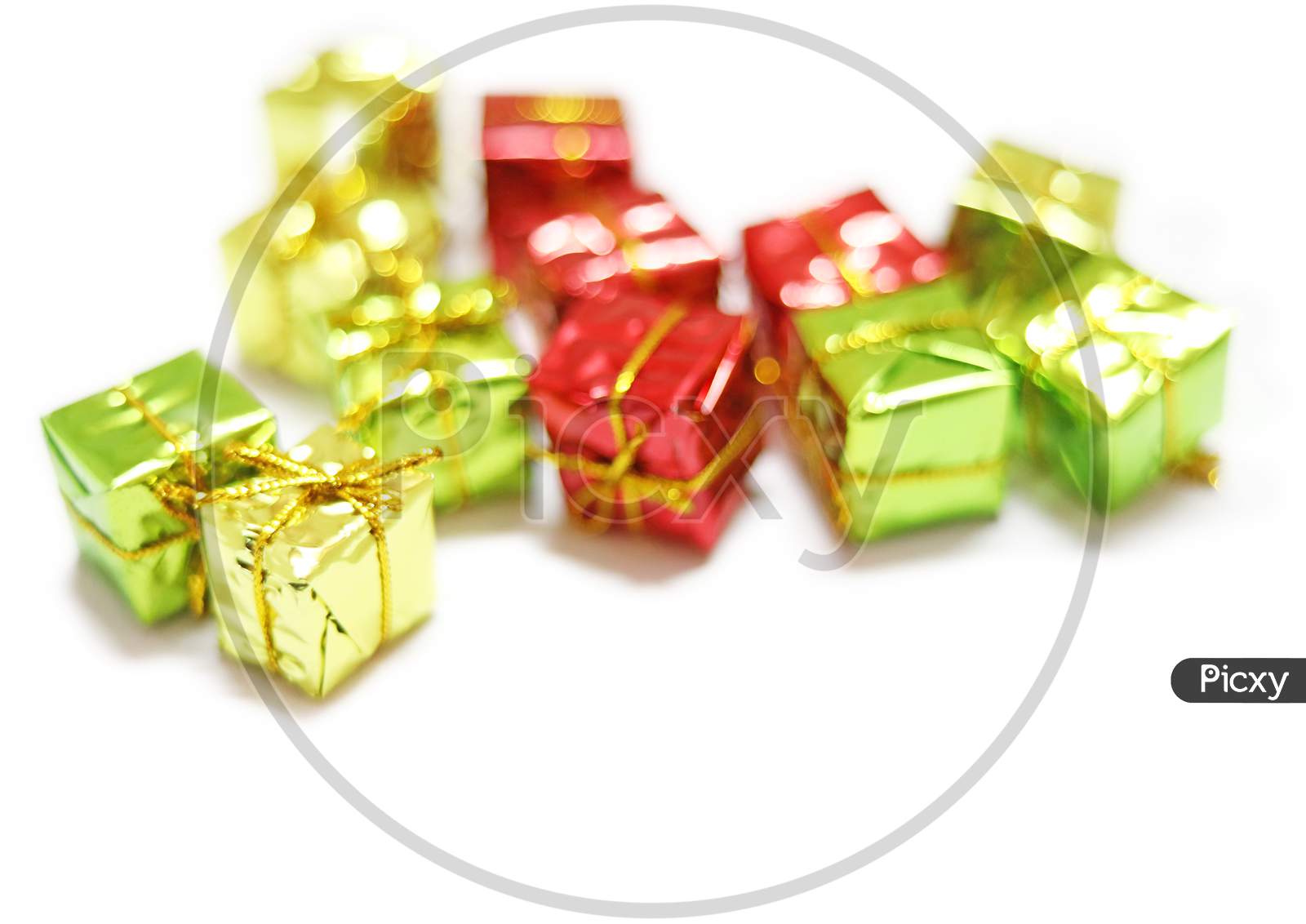 Top View Of Arranged Wrapped Christmas Gift Boxes With Ribbons On White Background