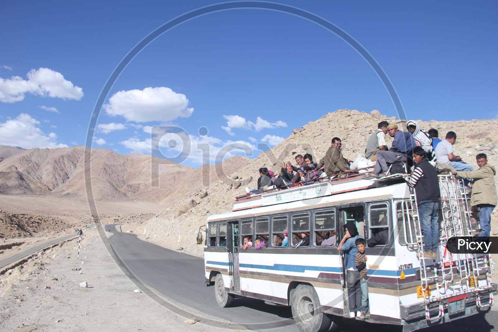 People traveling on buses