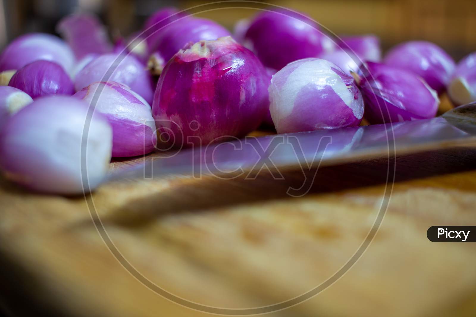 Peeled Onions (Shallots) Ready For Cut And Used In Cooking.