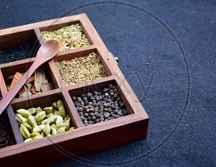 Close-up of wooden spice box for culinary use