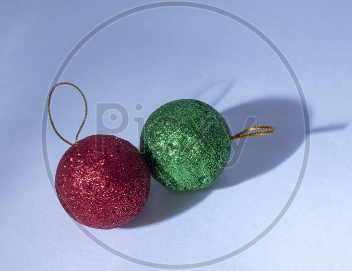 Green And Red Christmas Ball For Decoration, Isolated On White Background With Clipping Path.
