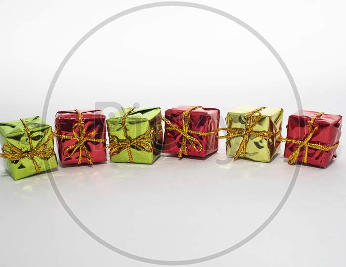 Beautiful Colored Gift Boxes With White Background Decorations.