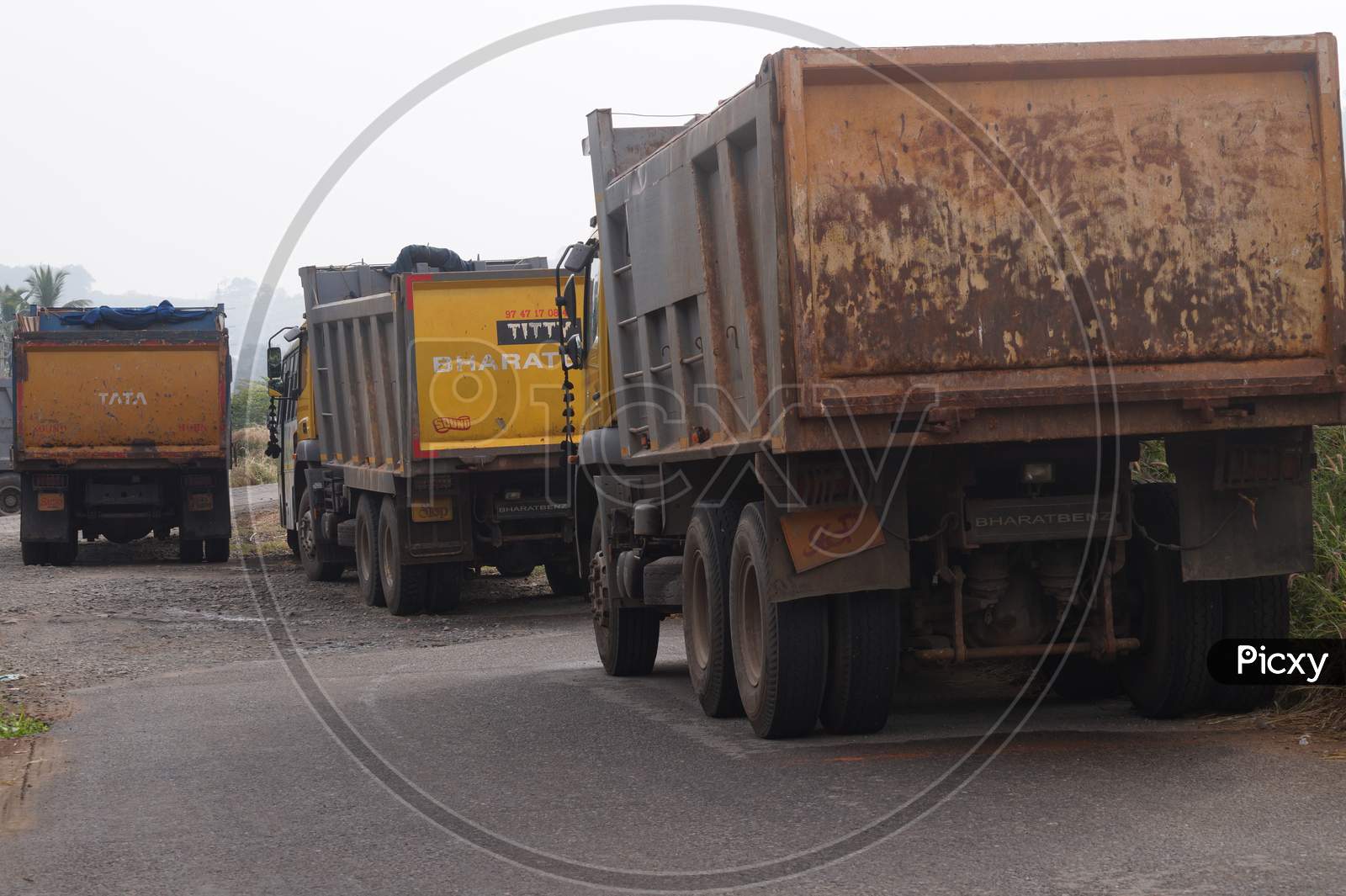 Thrissur, Kerala, India - 11-26-2020: Tipper Lorries Parked On The Side Of A Road