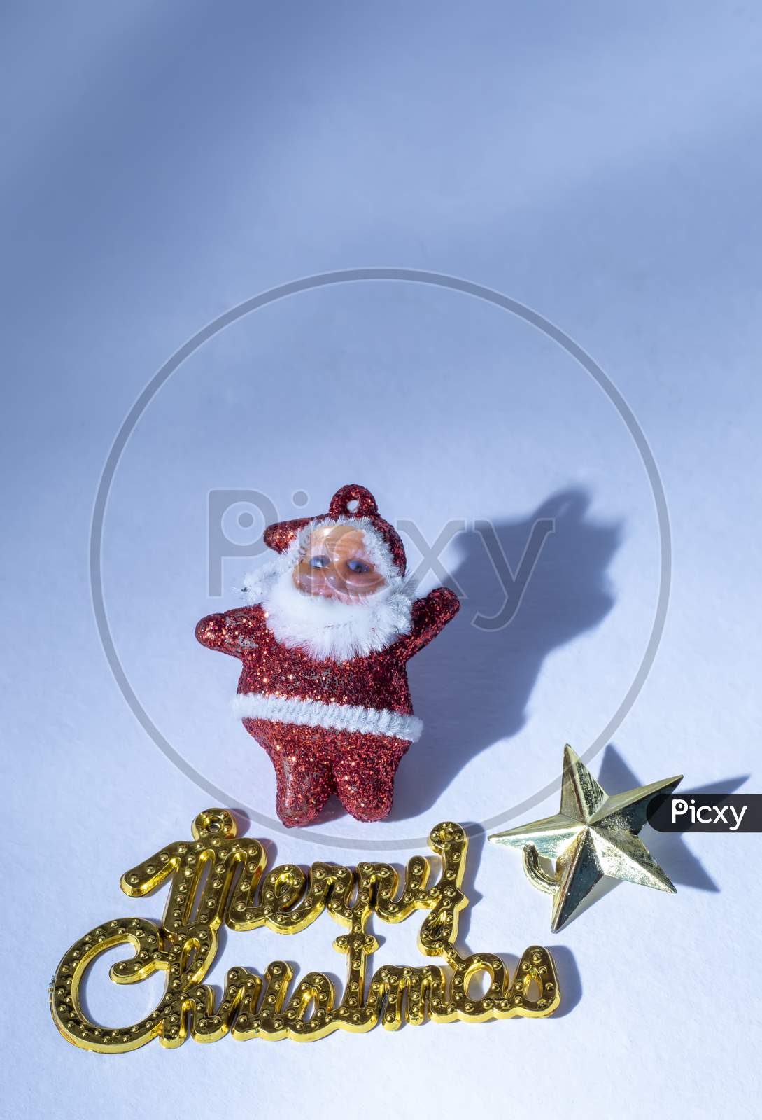 Santa Claus Isolated On A White Background Or Snow Background With Star And Merry Christmas Gold Text