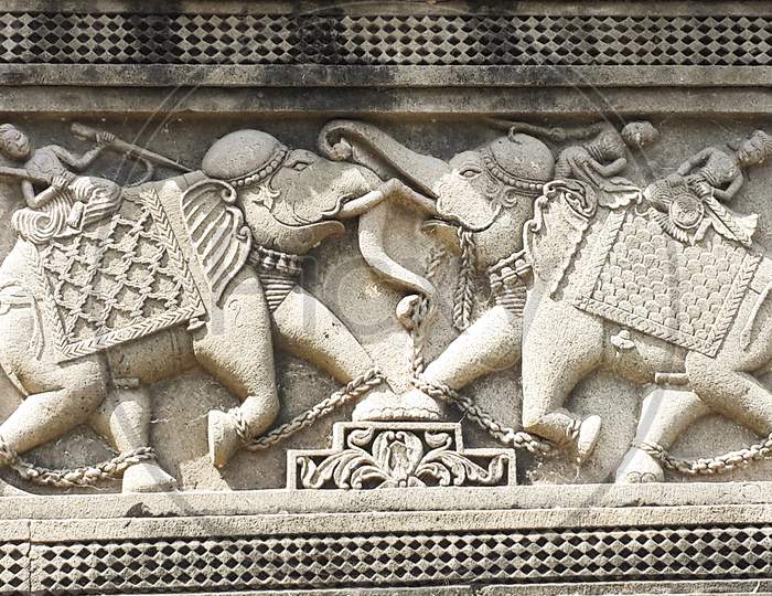 Elephant mural art in white marble at Jain temple