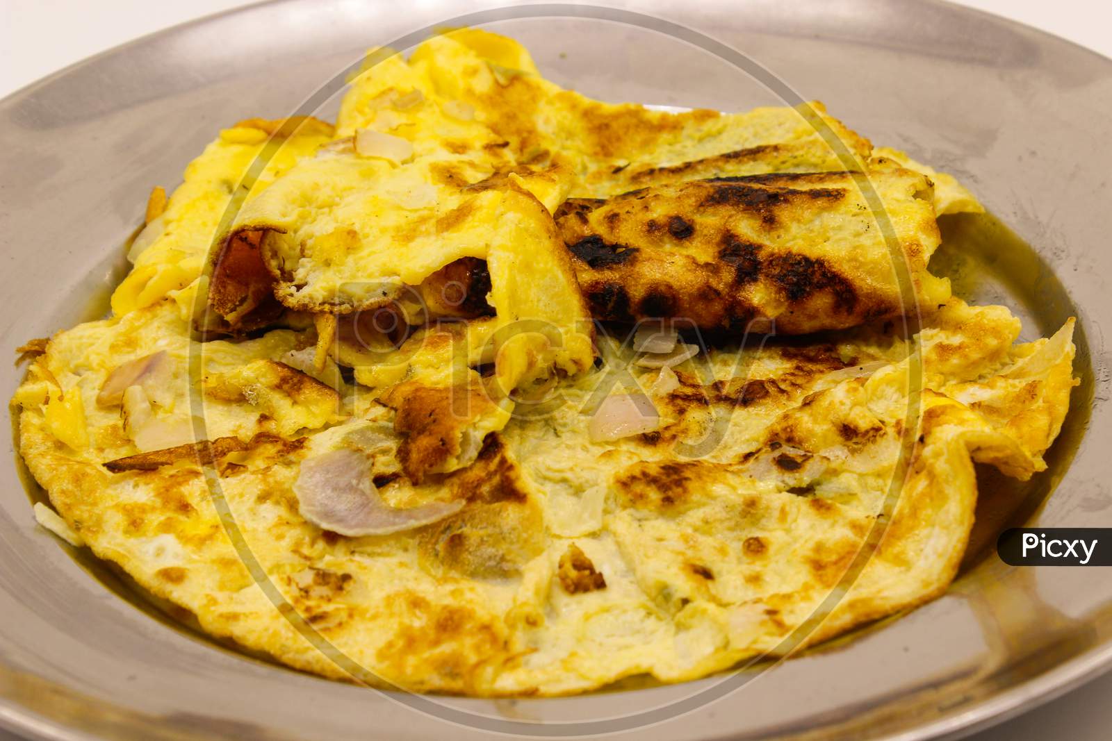 A Picture Of Omelette With Selective Focus