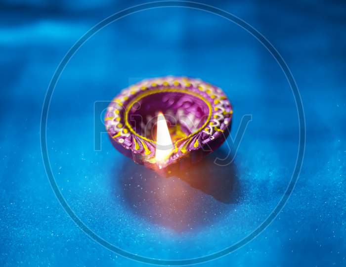 Beautiful Clay Diya Lamps Lit During Diwali Celebration, Selective Focus