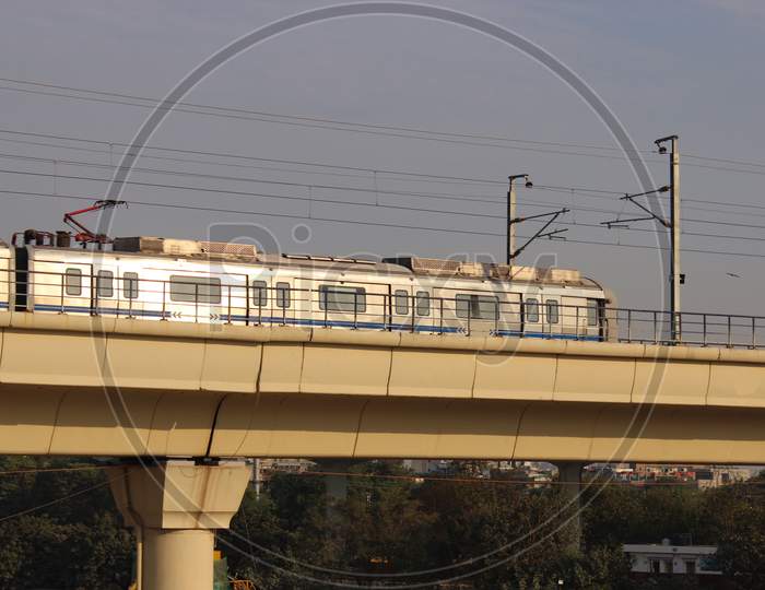 A Picture Of Indian Metro Train With Selective Focus
