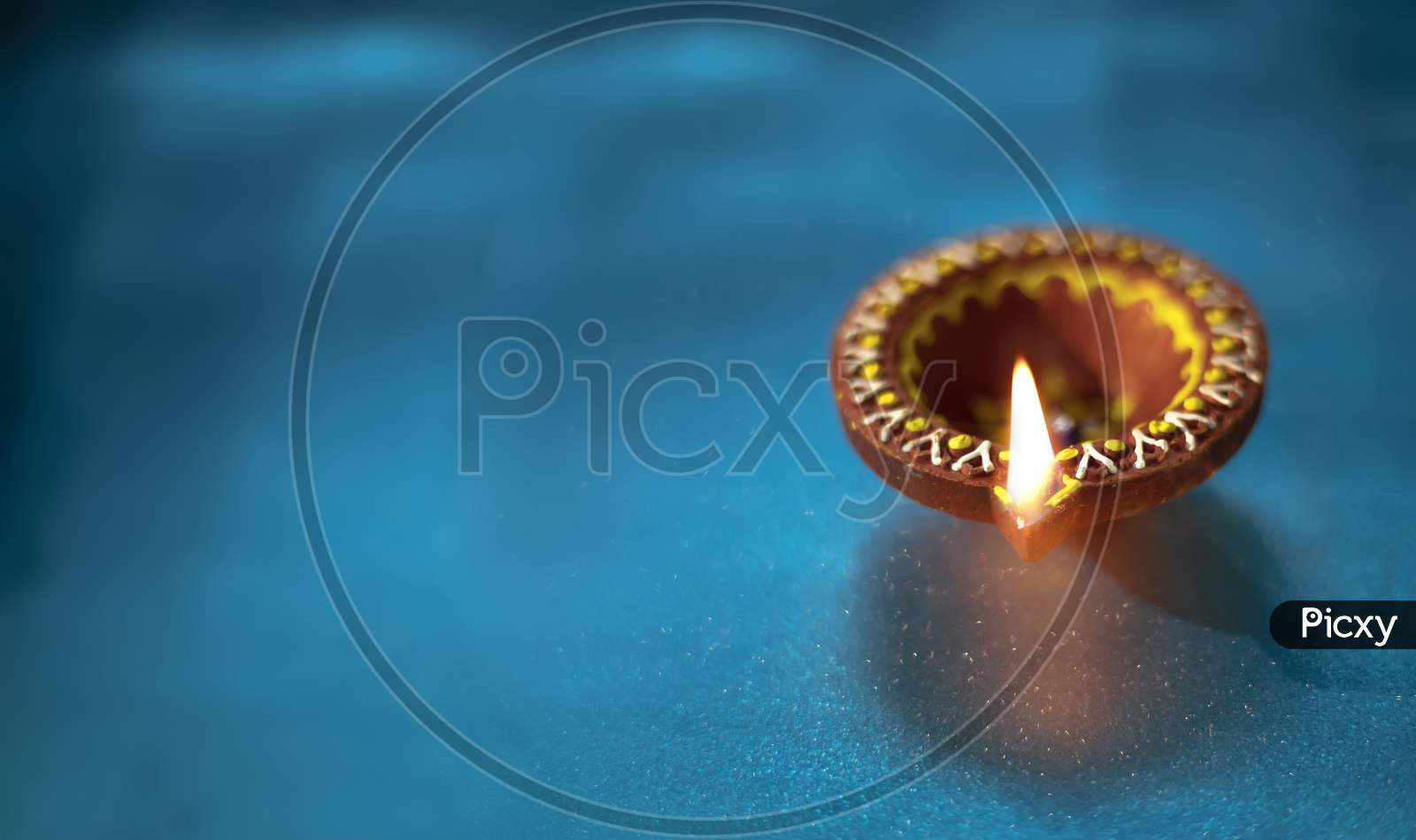 Beautiful Clay Diya Lamps Lit During Diwali Celebration, Selective Focus