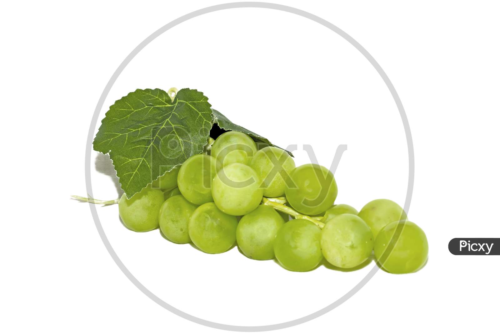 Bunch Of Green Seedless Grape Isolated On White Background.