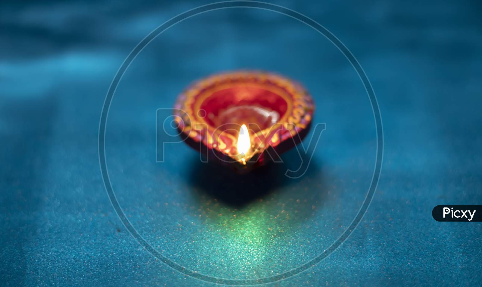 Colorful Clay Diya Lamps Lit During Diwali Celebration, Selective Focus