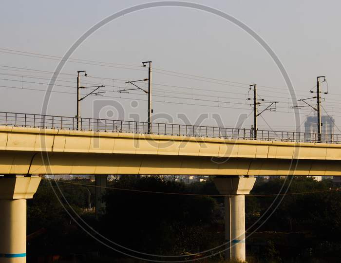 A Picture Of Indian Metro Train Bridge With Selective Focus