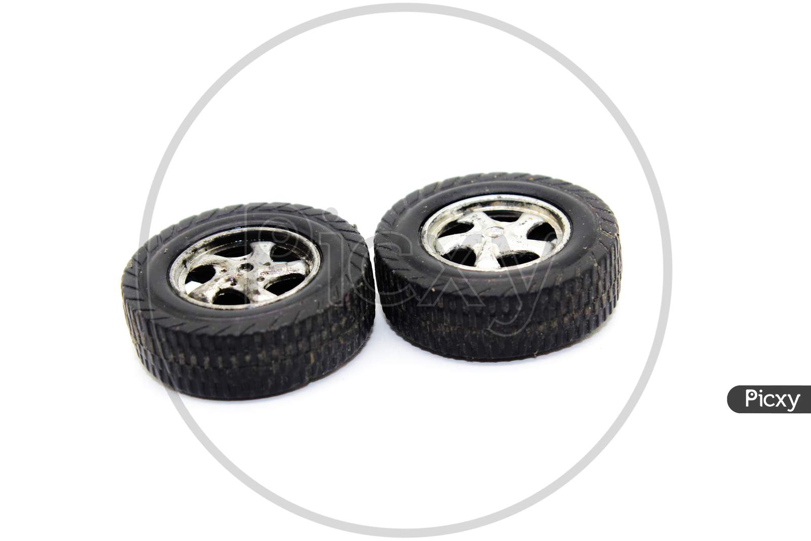 A Picture Of Car Tires With Selective Focus
