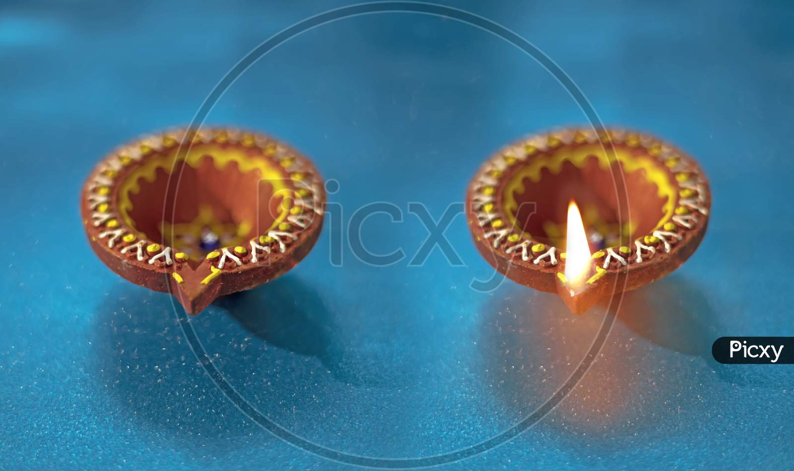 Beautiful Clay Diya Lamps Lit During Diwali Celebration