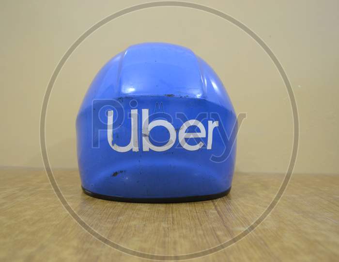Blue motorcycle helmet, uber, blue helmet.