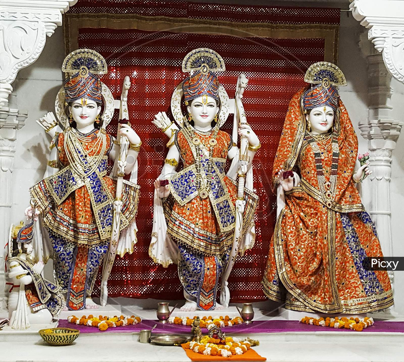 Marble statue in traditional dress of hindu God Ram, Lakshman and Goddess Sita