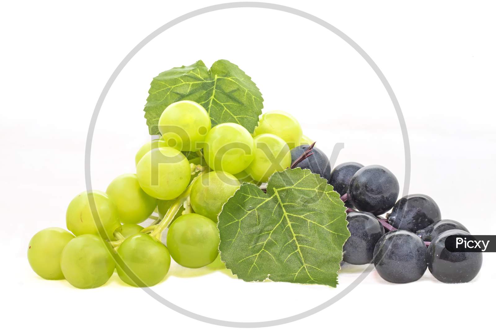 Bunch Of Black Grape With Green Seedless Grape Isolated On White Background.