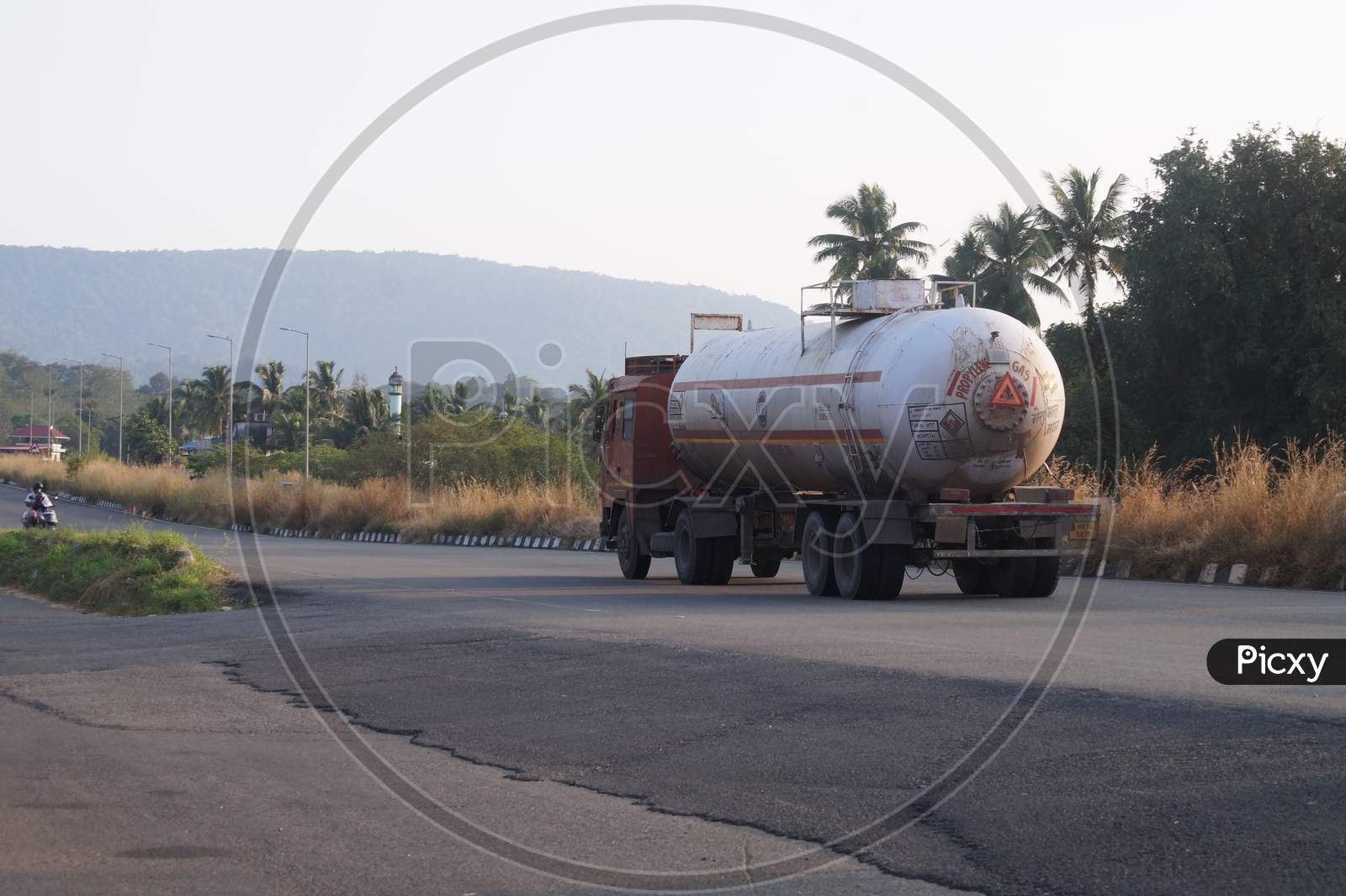 Thrissur, Kerala, India - 11-28-2020: Truck Carries Propylene Gas Passing Through The Highway. The Chemical And Plastics Industries Rely On Propylene As A Fuel Gas.