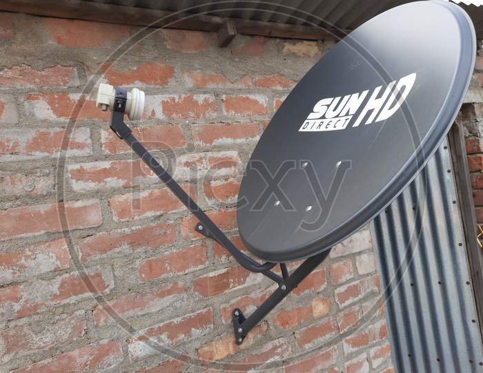 Dish Antenna image in home wall, black antenna image, Background Blur, satellite dishes