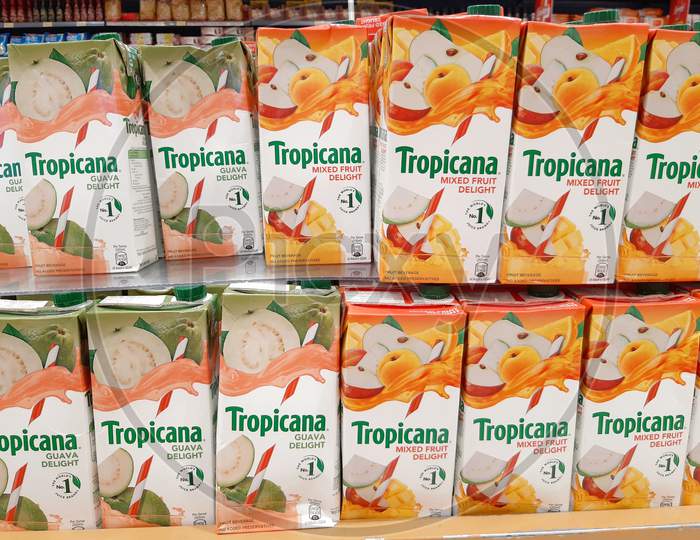 kochi, India - 23 April 2021 :Tropicana brand juice boxes for sale at a grocery store in flavors of guava, mixed fruit .