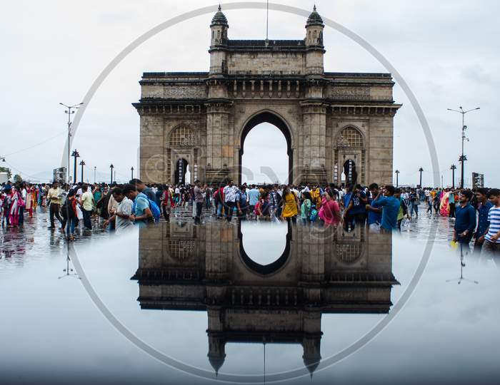 reflection of gate way of india.