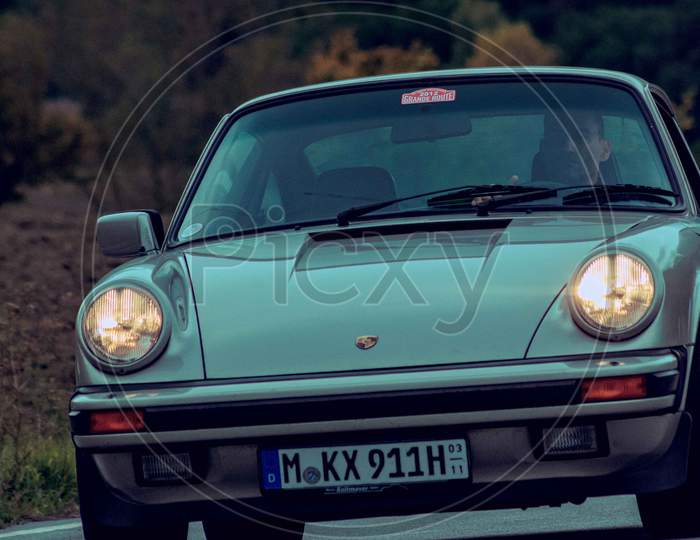 Porsche Carrera 911 On An Old Racing Car In Rally Mille Miglia 2020 The Famous Italian Historical Race (1927-1957)