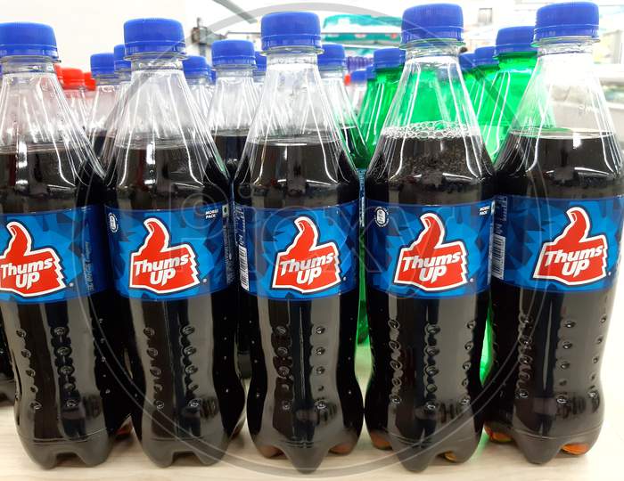 Kochi, India- 23 April 2021 : Bottles of thums up on display in a shopping mall
