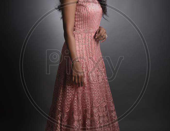 Indian girl wearing traditional designer wear