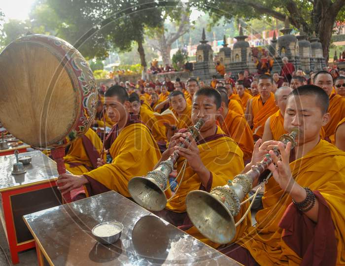 Buddhist Monks offering prayers