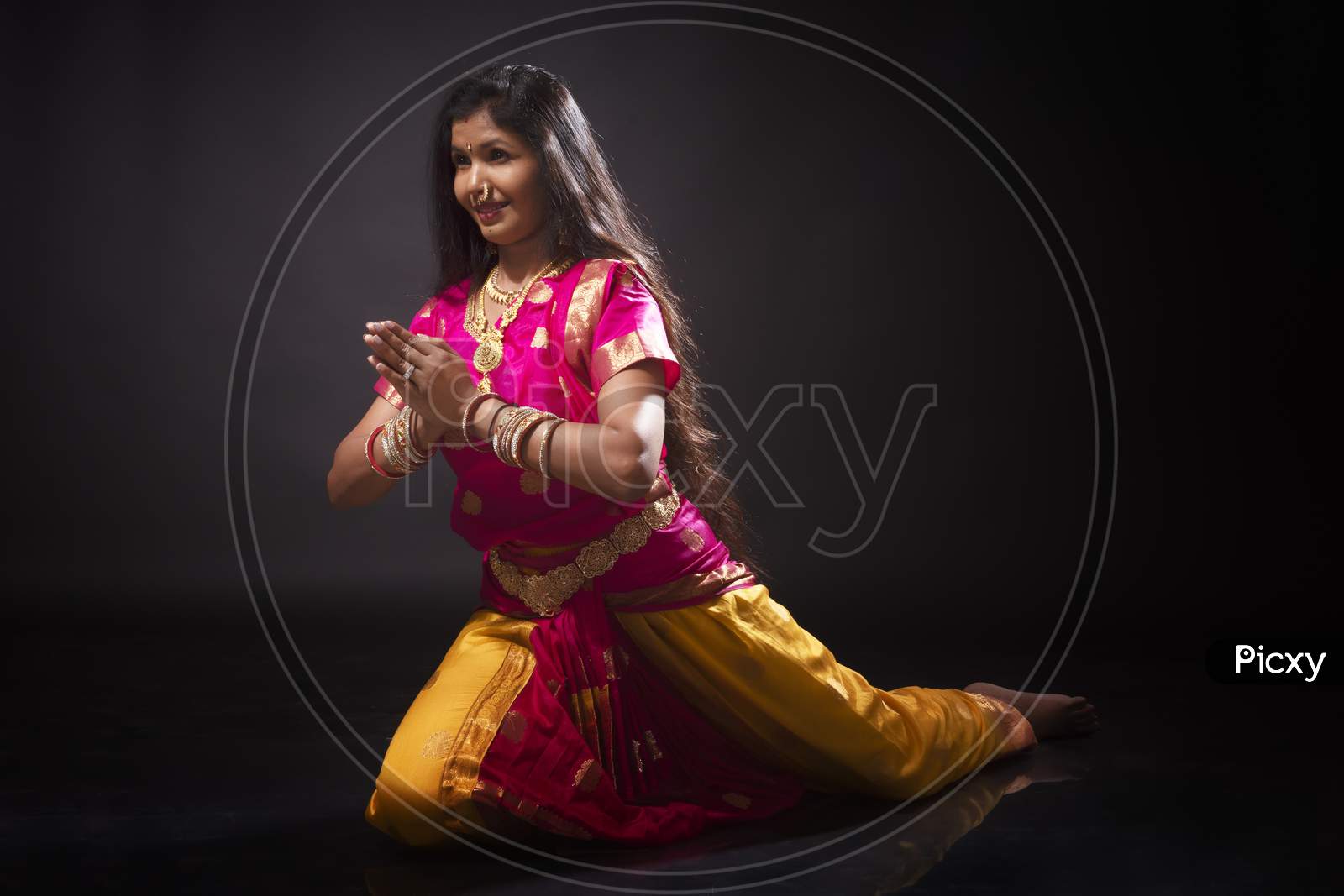 Indian woman performing classical Bharatanatyam dance