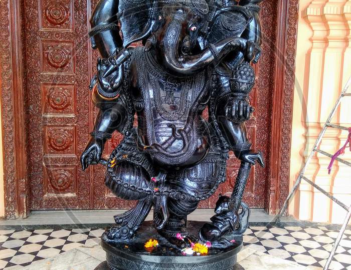black colour Ganesh statue Chhatarpur Mandir