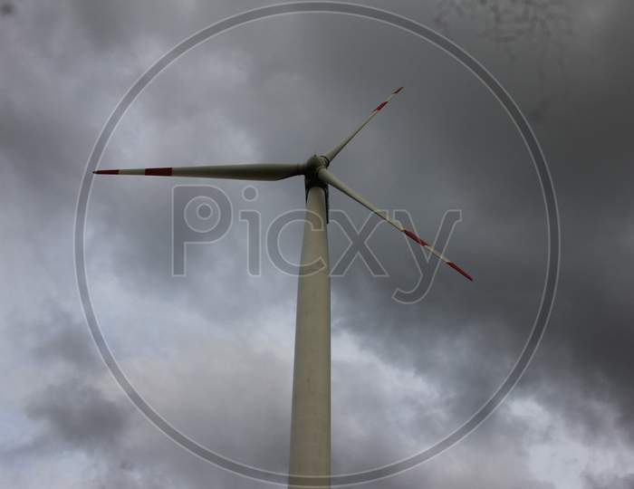 Windmill with sky in background