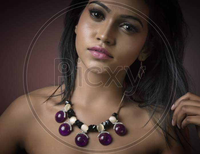 Young Indian lady wearing fashion accessories