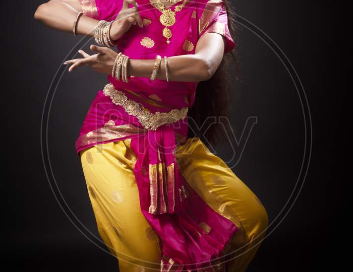 Indian woman performing classical Bharatanatyam dance