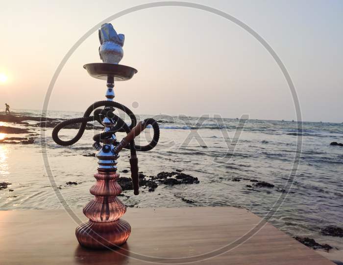 Anjuna- india / Goa - December 2019: hookah at sea shore, chilling out and relaxing (selective focus)