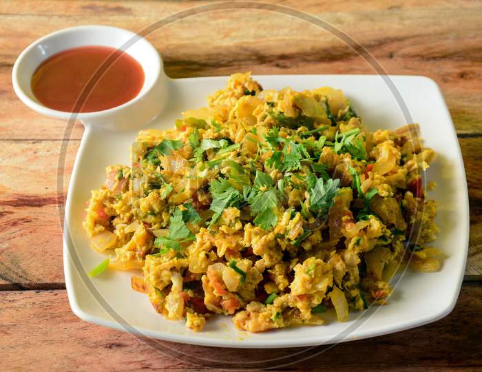 Egg Bhurji, A Preparation Of Scrambled Eggs With Tomatoes,Onions,Gingers And Green Chilies Served With Tomato Sauce, Selective Focus