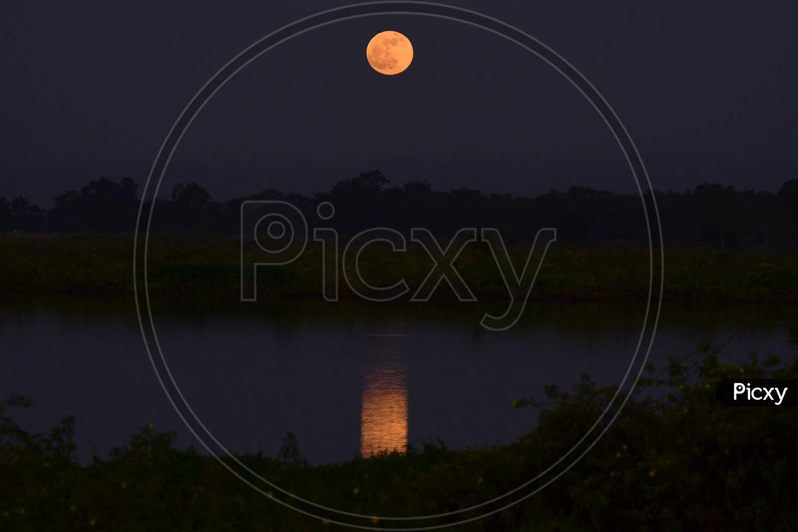 A view of  Full Moon on the auspicious day of Kartik Purnima (full moon day)in Nagaon District of Assam  on Nov 30,2020.