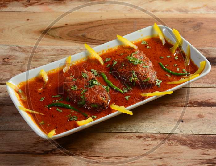 Traditional Bengali Cuisine - Katla Curry Is Bengali Fish Recipe Served On A Ceramic White Bowl, Selective Focus