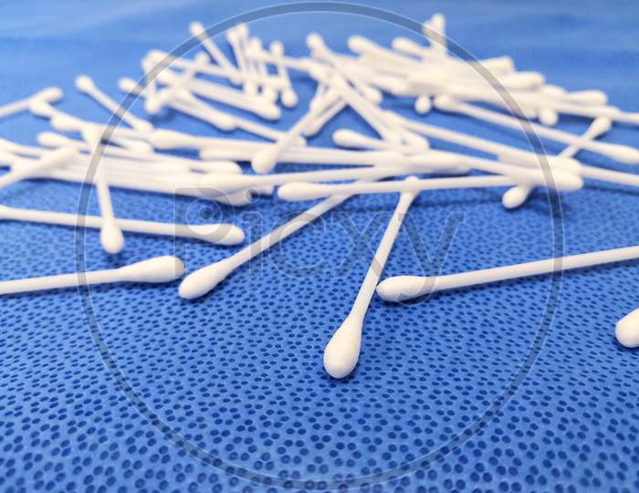 Cotton Ear Buds In Blue Background